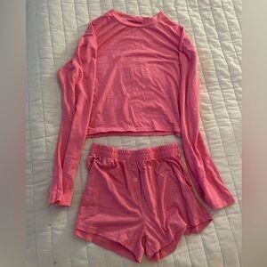 Pink lounge set with shorts and a long sleeve